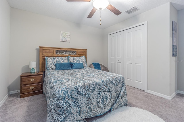 13527 Willow Bluestar Loop, Riverview, FL 33579 - carpeted bedroom featuring a closet and ceiling fan