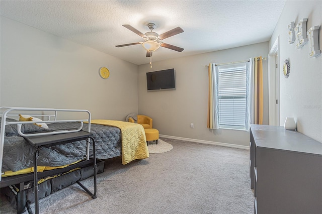 13527 Willow Bluestar Loop, Riverview, FL 33579 - bedroom featuring carpet floors, a textured ceiling, and a ceiling fan