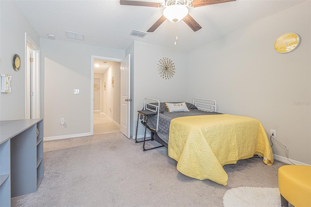 13527 Willow Bluestar Loop, Riverview, FL 33579 - bedroom featuring light carpet and a ceiling fan