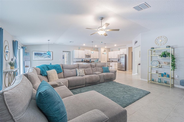13527 Willow Bluestar Loop, Riverview, FL 33579 - living room featuring ceiling fan, lofted ceiling, and light tile patterned floors
