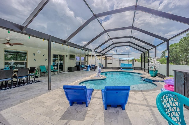 13527 Willow Bluestar Loop, Riverview, FL 33579 - view of swimming pool with a patio area, glass enclosure, a pool with connected hot tub, and a ceiling fan