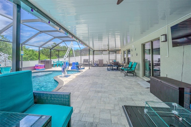 13527 Willow Bluestar Loop, Riverview, FL 33579 - view of pool featuring a patio area, glass enclosure, and outdoor lounge area