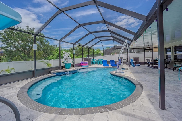 13527 Willow Bluestar Loop, Riverview, FL 33579 - view of pool with a patio area, a fenced backyard, and glass enclosure