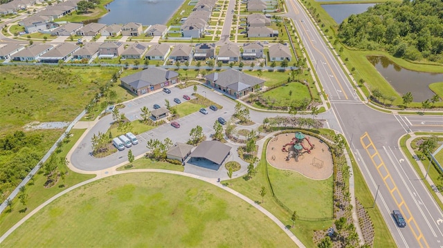 13527 Willow Bluestar Loop, Riverview, FL 33579 - aerial perspective of suburban area with a large body of water