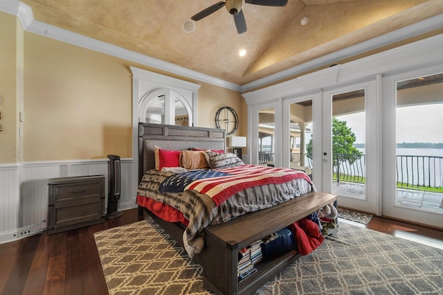 12125 Stonelake Ranch Blvd, Thonotosassa, FL 33592 - bedroom featuring access to exterior, lofted ceiling, wood finished floors, wainscoting, and french doors