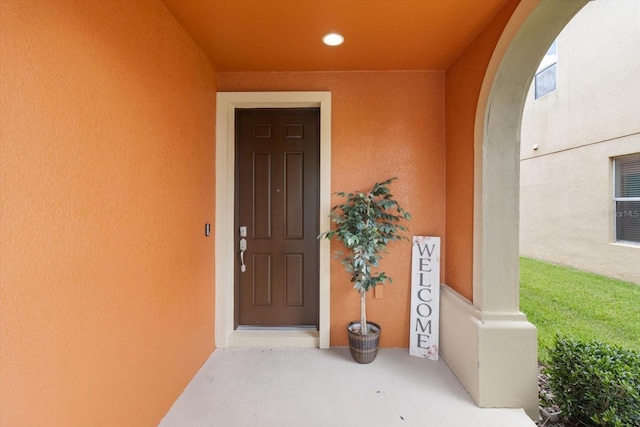 3994 Medicci Ln, Wesley Chapel, FL 33543 - doorway to property with stucco siding