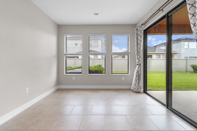 3994 Medicci Ln, Wesley Chapel, FL 33543 - empty room featuring light tile patterned floors
