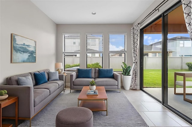 3994 Medicci Ln, Wesley Chapel, FL 33543 - living room featuring light tile patterned floors and recessed lighting