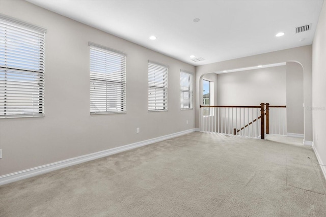 3994 Medicci Ln, Wesley Chapel, FL 33543 - unfurnished room featuring carpet, recessed lighting, and arched walkways
