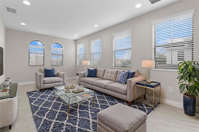 3994 Medicci Ln, Wesley Chapel, FL 33543 - carpeted living room featuring healthy amount of natural light and recessed lighting