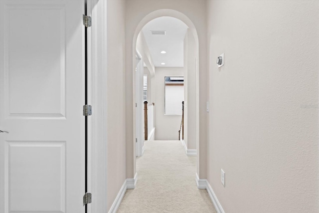 3994 Medicci Ln, Wesley Chapel, FL 33543 - corridor featuring light colored carpet and arched walkways