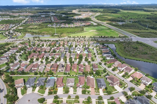 3994 Medicci Ln, Wesley Chapel, FL 33543 - aerial view of property and surrounding area with a nearby body of water and nearby suburban area
