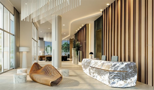 235 1st Ave S Unit 3708, Saint Petersburg, FL 33701 - community lobby featuring a high ceiling and wallpapered walls
