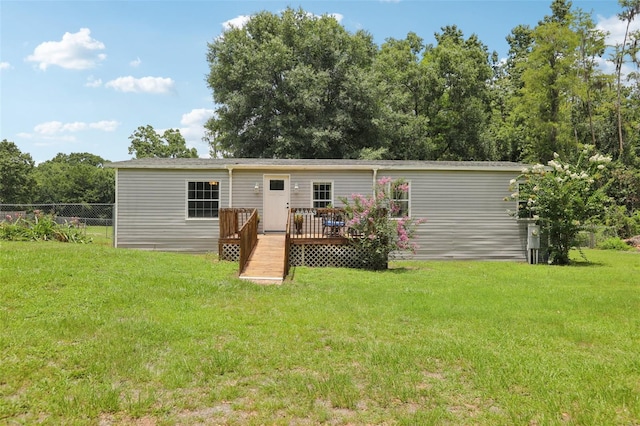 26223 Chianina Dr, Wesley Chapel, FL 33544 - rear view of house featuring a wooden deck
