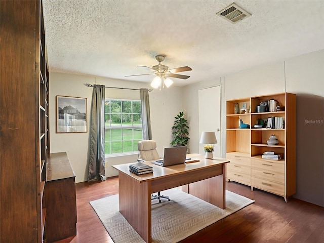 26223 Chianina Dr, Wesley Chapel, FL 33544 - office area with a textured ceiling, dark wood finished floors, and a ceiling fan
