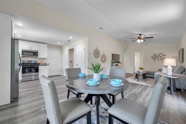1561 S Martin Luther King Jr Ave, Clearwater, FL 33756 - dining space featuring light wood-style flooring, ceiling fan, and recessed lighting