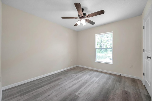 1561 S Martin Luther King Jr Ave, Clearwater, FL 33756 - unfurnished room with wood finished floors and ceiling fan