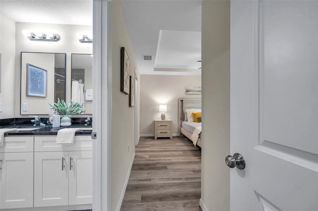 1561 S Martin Luther King Jr Ave, Clearwater, FL 33756 - hall featuring light wood-style flooring and a sink