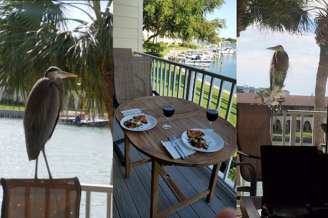 459 Haven Point Dr, Treasure Island, FL 33706 - balcony with a water view and outdoor dining space