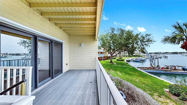 459 Haven Point Dr, Treasure Island, FL 33706 - wooden terrace with a water view