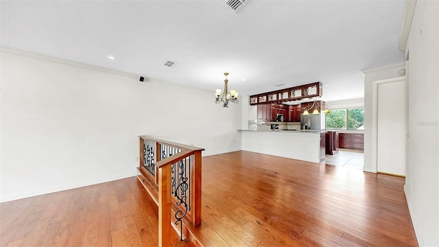 459 Haven Point Dr, Treasure Island, FL 33706 - living room with a chandelier, light wood-type flooring, ornamental molding, and recessed lighting