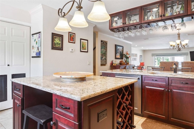 459 Haven Point Dr, Treasure Island, FL 33706 - kitchen featuring reddish brown cabinets, a kitchen island, dishwasher, crown molding, and light tile patterned floors