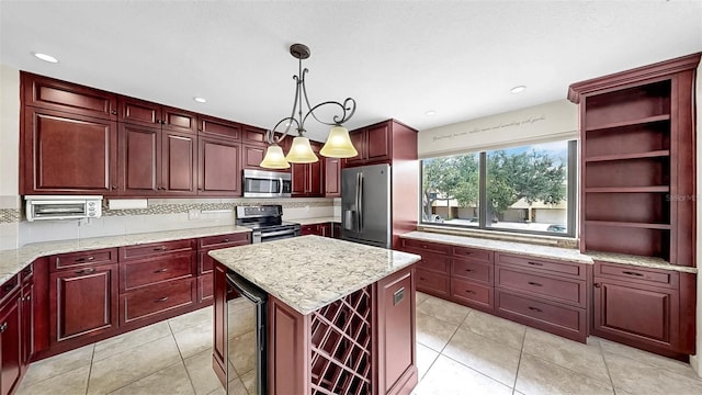 459 Haven Point Dr, Treasure Island, FL 33706 - kitchen featuring stainless steel appliances, wine cooler, reddish brown cabinets, decorative backsplash, and a kitchen island