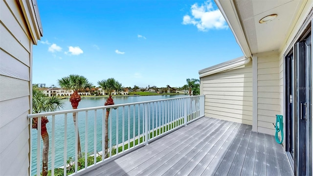 459 Haven Point Dr, Treasure Island, FL 33706 - wooden terrace with a water view