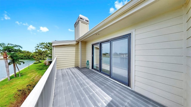 459 Haven Point Dr, Treasure Island, FL 33706 - wooden deck with a water view