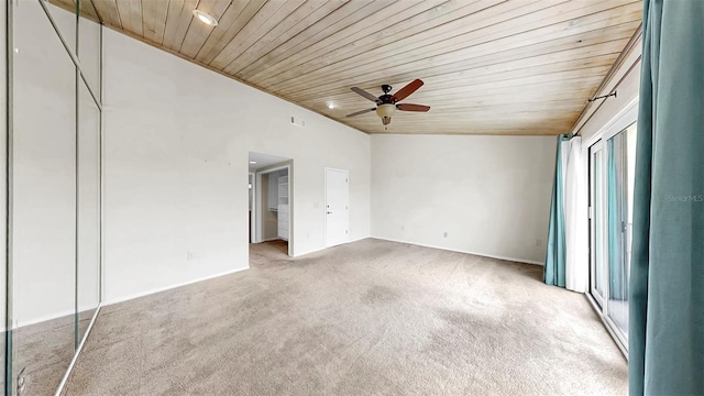 459 Haven Point Dr, Treasure Island, FL 33706 - carpeted empty room featuring wood ceiling, vaulted ceiling, and a ceiling fan