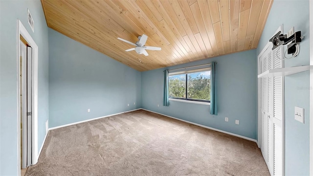 459 Haven Point Dr, Treasure Island, FL 33706 - unfurnished bedroom with carpet flooring, wooden ceiling, lofted ceiling, and ceiling fan