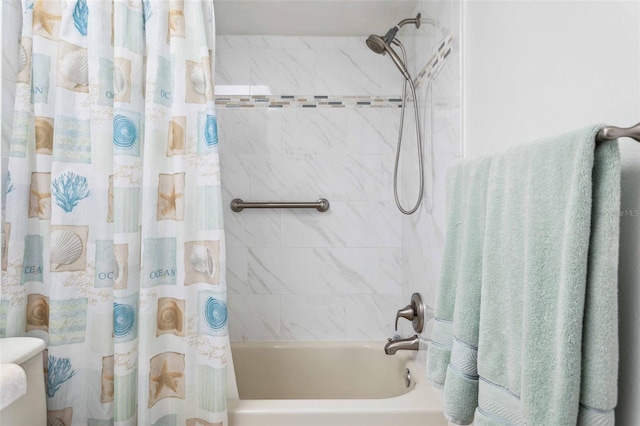 459 Haven Point Dr, Treasure Island, FL 33706 - bathroom featuring shower / bath combo with shower curtain and toilet