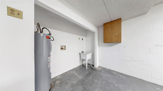 459 Haven Point Dr, Treasure Island, FL 33706 - laundry area with water heater, washer hookup, and concrete block wall