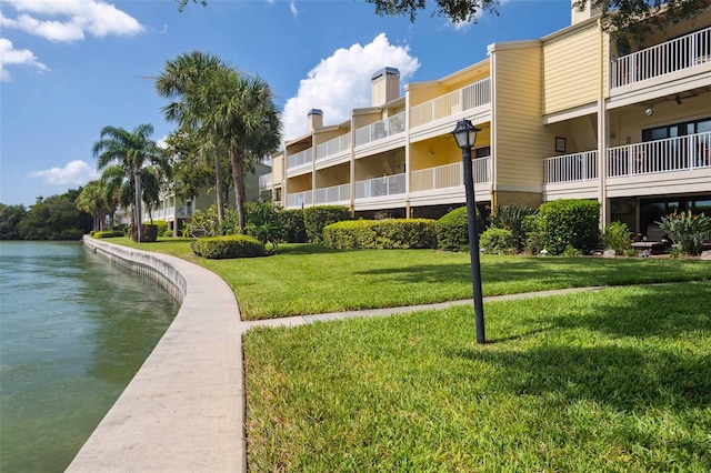 459 Haven Point Dr, Treasure Island, FL 33706 - view of property's community with a water view and a yard