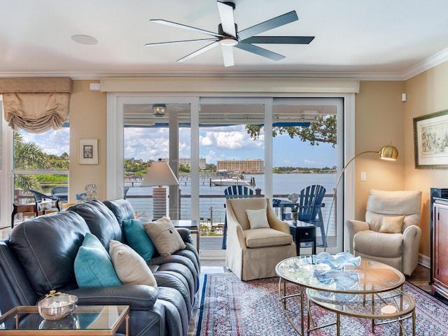 8 Sunset Bay Dr, Belleair, FL 33756 - living room with ceiling fan, crown molding, wood finished floors, and a water view