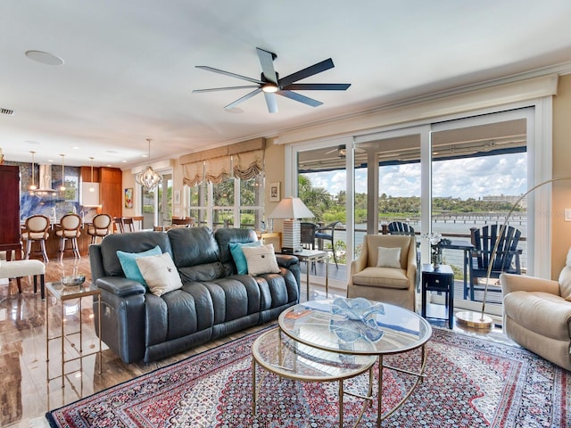 8 Sunset Bay Dr, Belleair, FL 33756 - living room featuring a ceiling fan, healthy amount of natural light, a chandelier, and crown molding