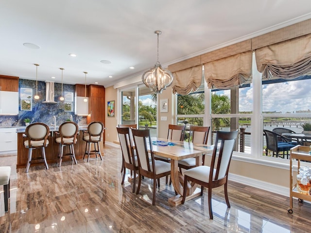 8 Sunset Bay Dr, Belleair, FL 33756 - dining room featuring a chandelier, ornamental molding, and recessed lighting