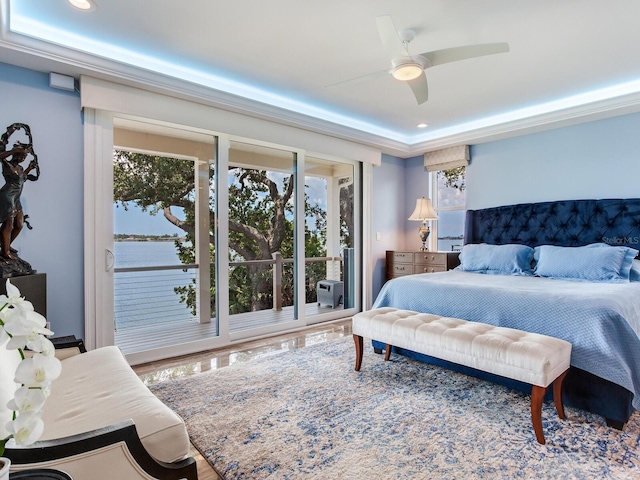 8 Sunset Bay Dr, Belleair, FL 33756 - bedroom featuring multiple windows, access to exterior, recessed lighting, and a ceiling fan