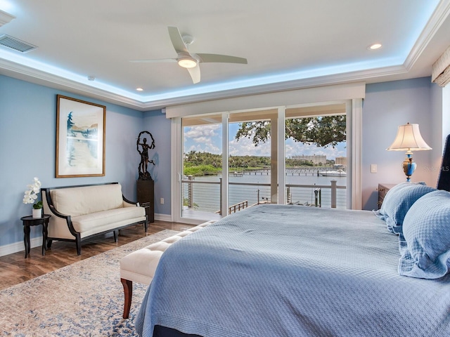 8 Sunset Bay Dr, Belleair, FL 33756 - bedroom with a raised ceiling, access to outside, wood finished floors, and recessed lighting