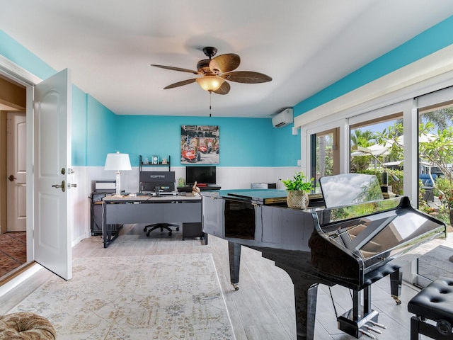 8 Sunset Bay Dr, Belleair, FL 33756 - home office featuring a wall unit AC, plenty of natural light, a ceiling fan, a wainscoted wall, and light wood-style flooring