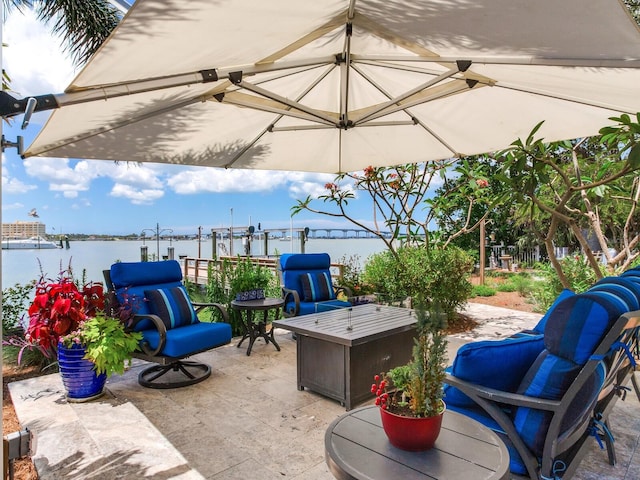 8 Sunset Bay Dr, Belleair, FL 33756 - view of patio / terrace featuring a water view