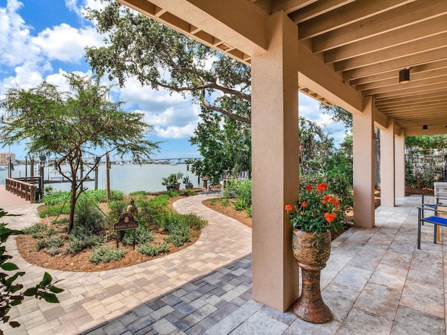 8 Sunset Bay Dr, Belleair, FL 33756 - view of patio / terrace featuring a water view