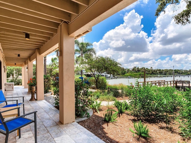 8 Sunset Bay Dr, Belleair, FL 33756 - view of patio featuring a water view