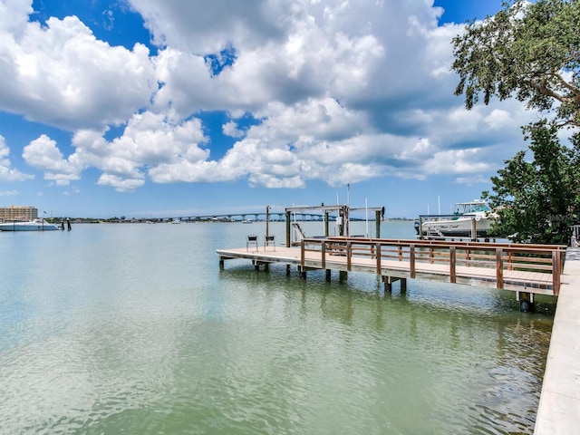 8 Sunset Bay Dr, Belleair, FL 33756 - dock area with a water view and boat lift