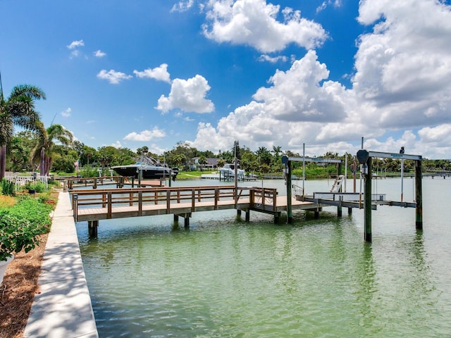 8 Sunset Bay Dr, Belleair, FL 33756 - dock area featuring boat lift and a water view