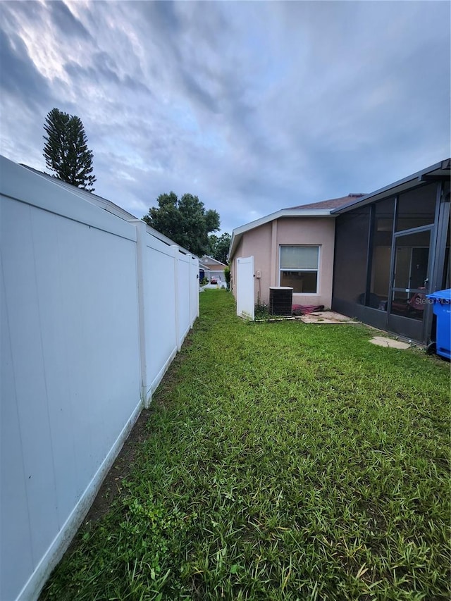 10539 Egret Haven Ln, Riverview, FL 33578 - view of green lawn with a sunroom