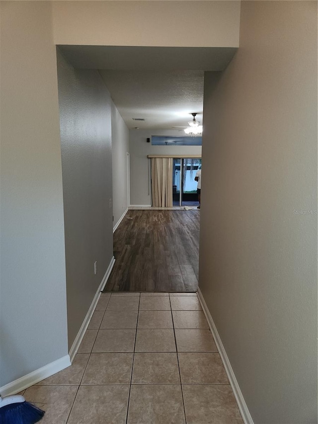10539 Egret Haven Ln, Riverview, FL 33578 - hallway with baseboards and tile patterned flooring