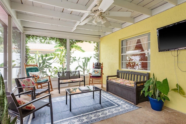 8629 Wolf Den Trl, Port Richey, FL 34668 - sunroom / solarium featuring outdoor lounge area, a ceiling fan, and beam ceiling