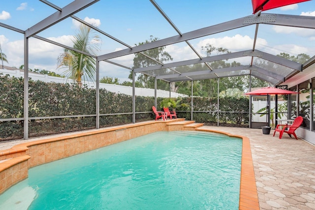8629 Wolf Den Trl, Port Richey, FL 34668 - view of pool featuring a patio area and a lanai