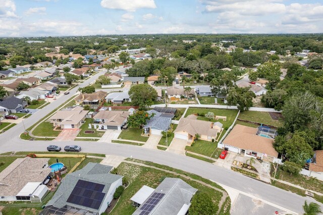 8629 Wolf Den Trl, Port Richey, FL 34668 - aerial view of property and surrounding area featuring nearby suburban area
